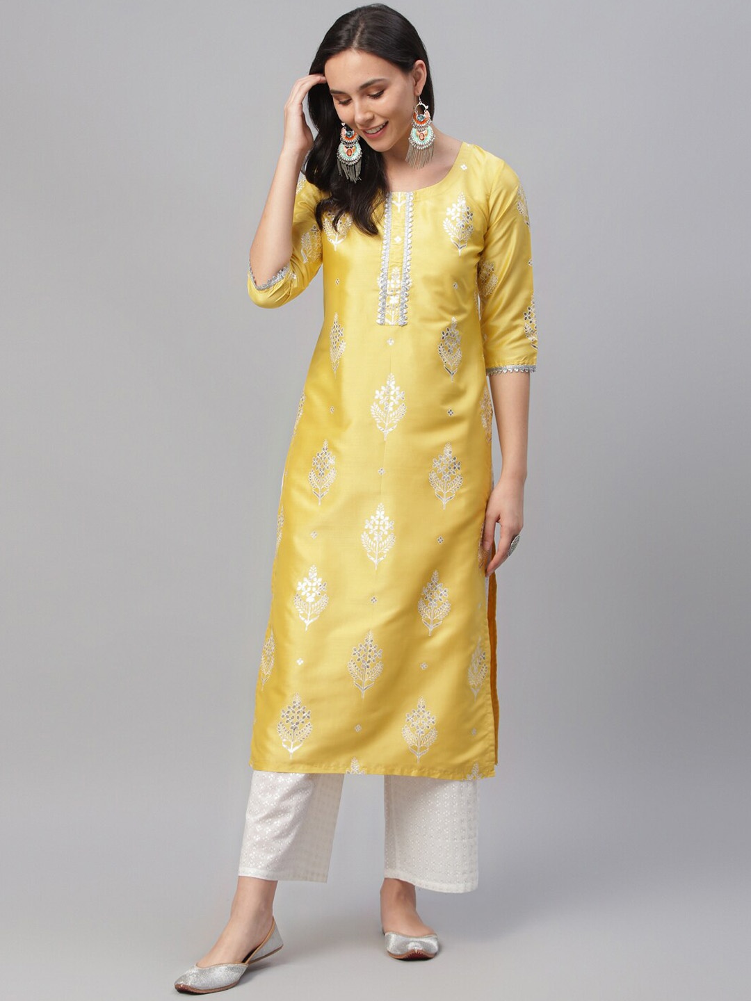 

Libas Women Yellow Printed Straight Kurta