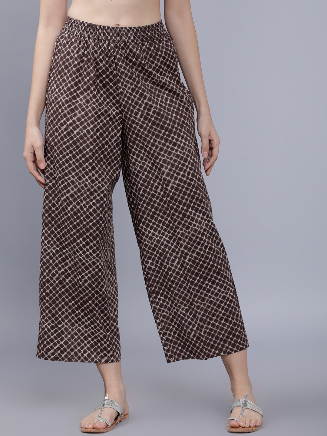 

Vishudh Women Brown Printed Straight Palazzos