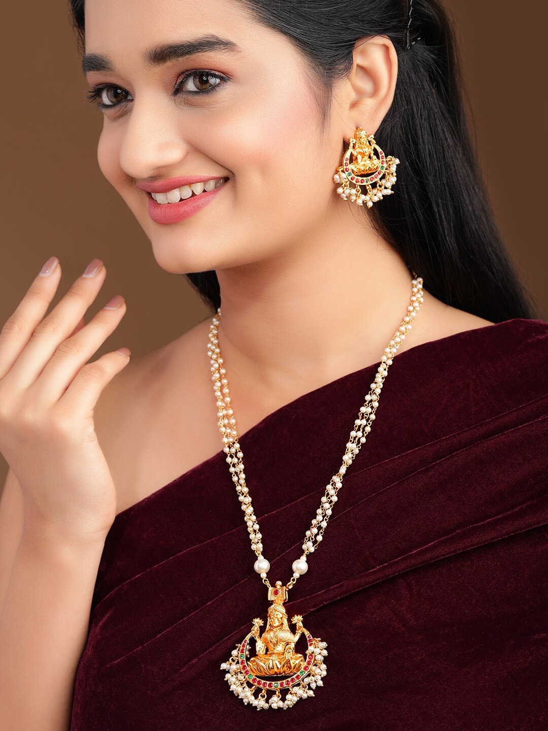 

Rubans Gold-Plated Off-White & Red Ruby Stone-Studded Pearl Embellished Temple Handcrafted Jewellery Set