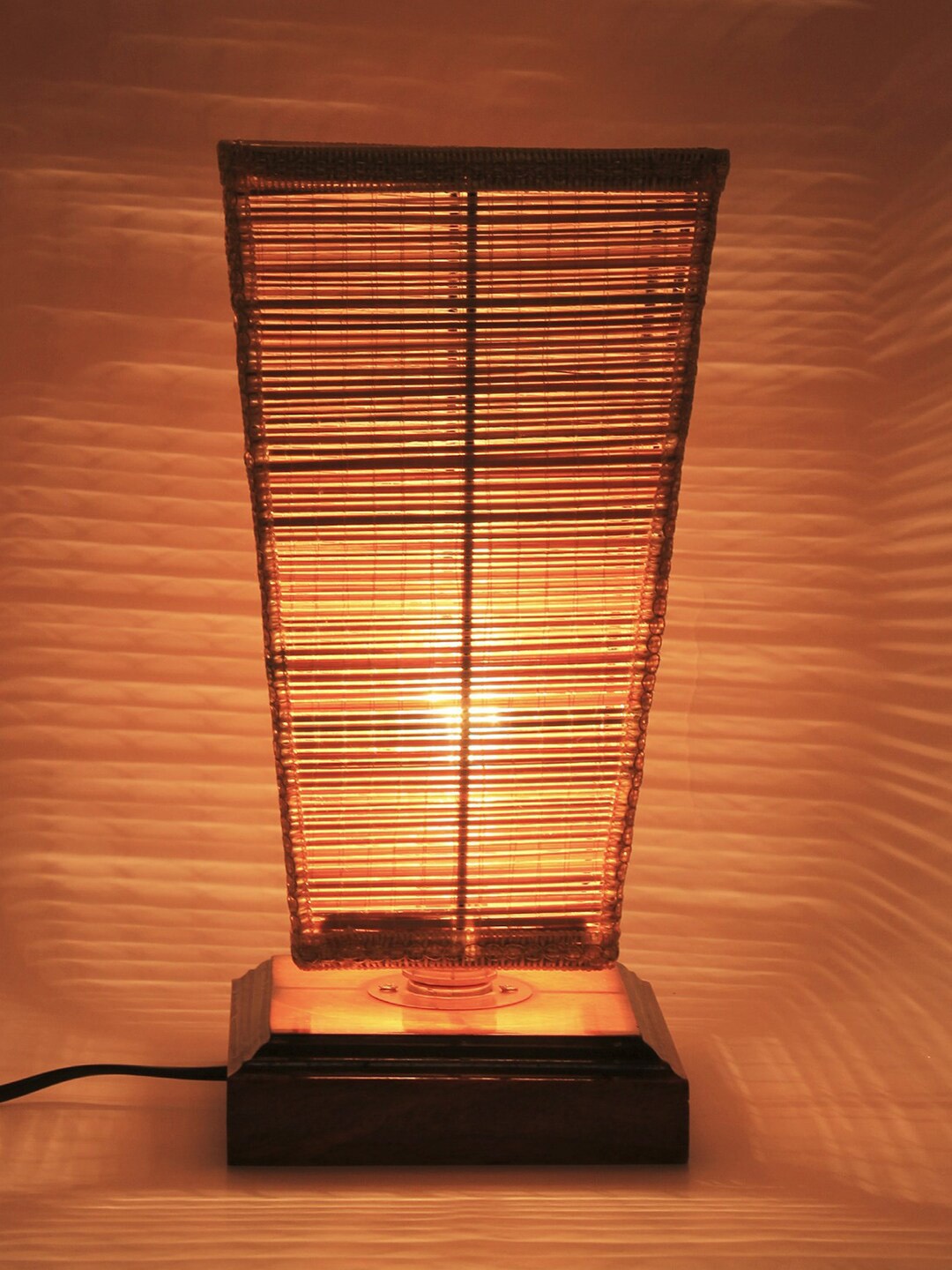 

Devansh Brown Solid Bamboo Conical Table Lamp