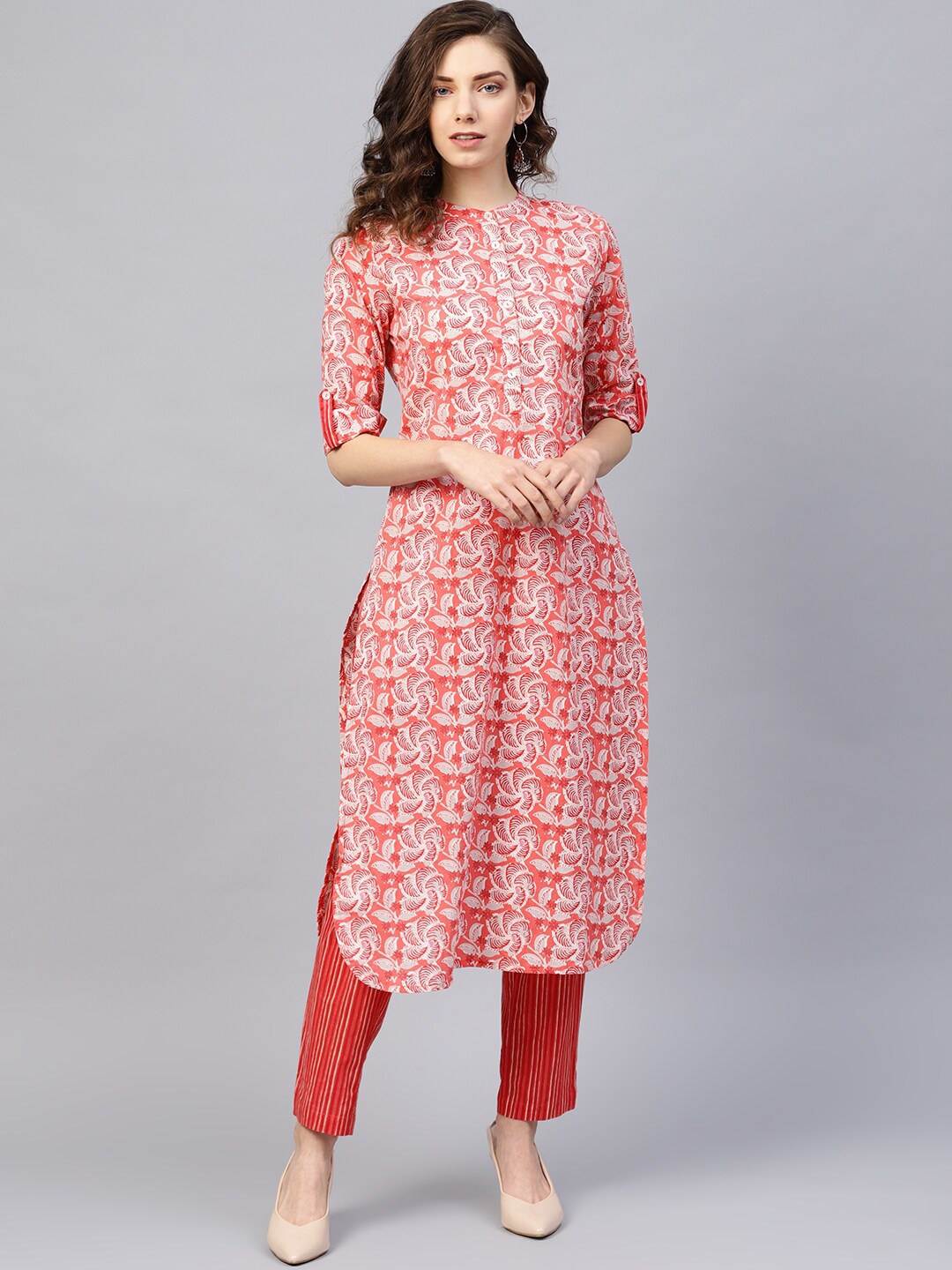 

KSUT Women Peach-Coloured & Red Printed Kurta with Trousers