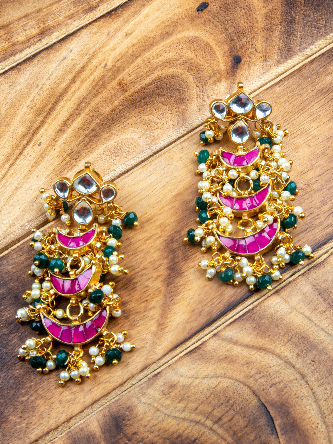 

MORKANTH JEWELLERY Gold-Plated & Pink Kundan Studded Crescent Shaped Chandbalis