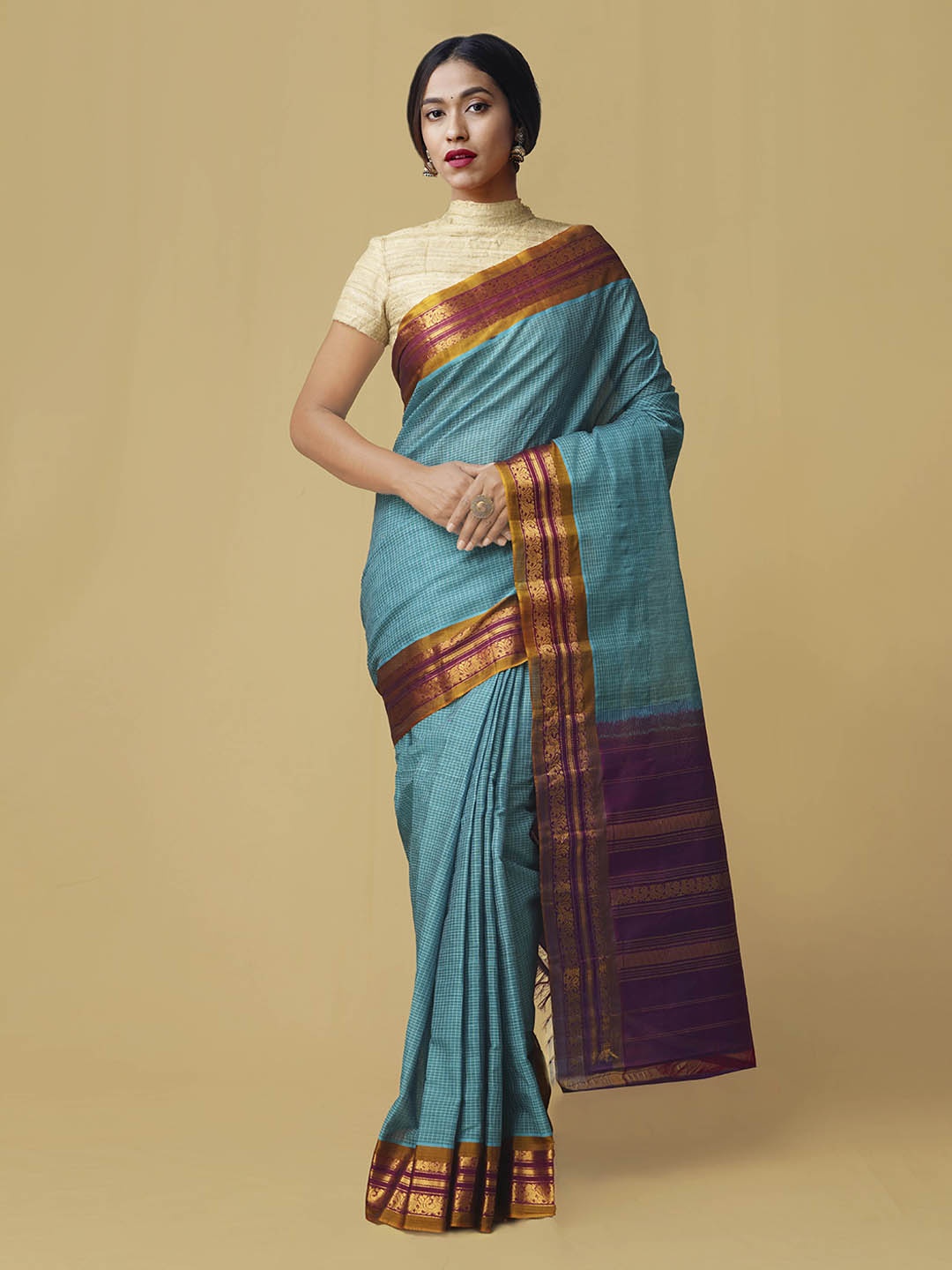 

Unnati Silks Blue & Gold-Coloured Silk Cotton Woven Design Gadwal Saree