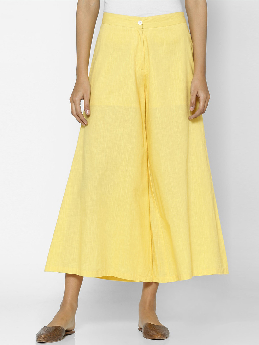 

Saaki Women Yellow Solid Wide Leg Palazzos