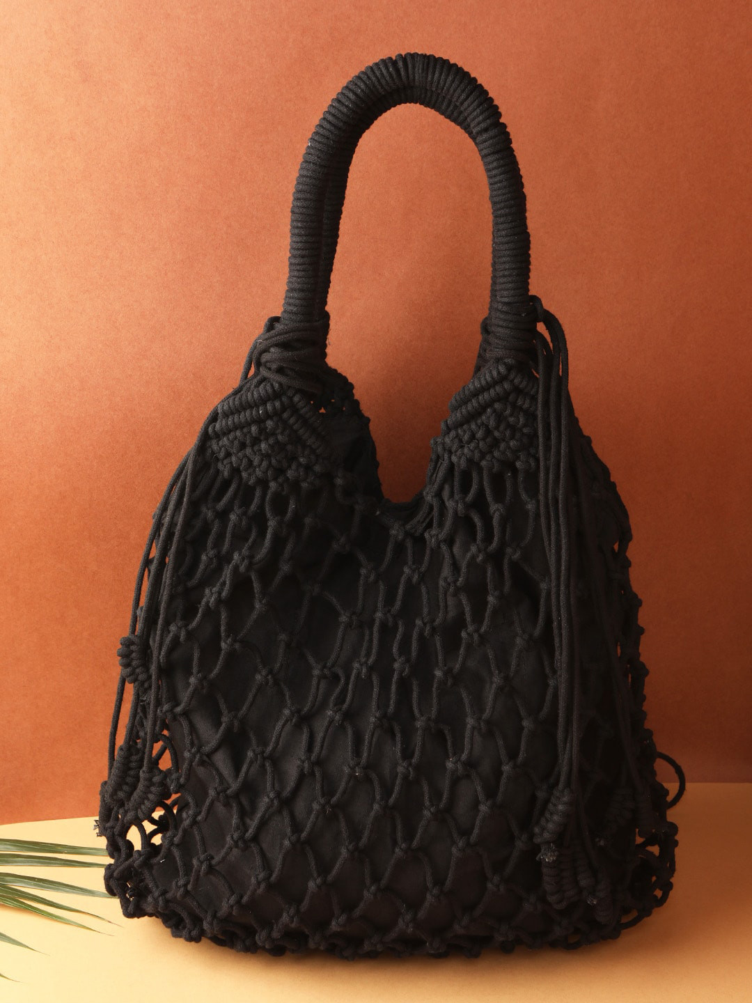 

STREET 9 Black Self Design Handheld Bag