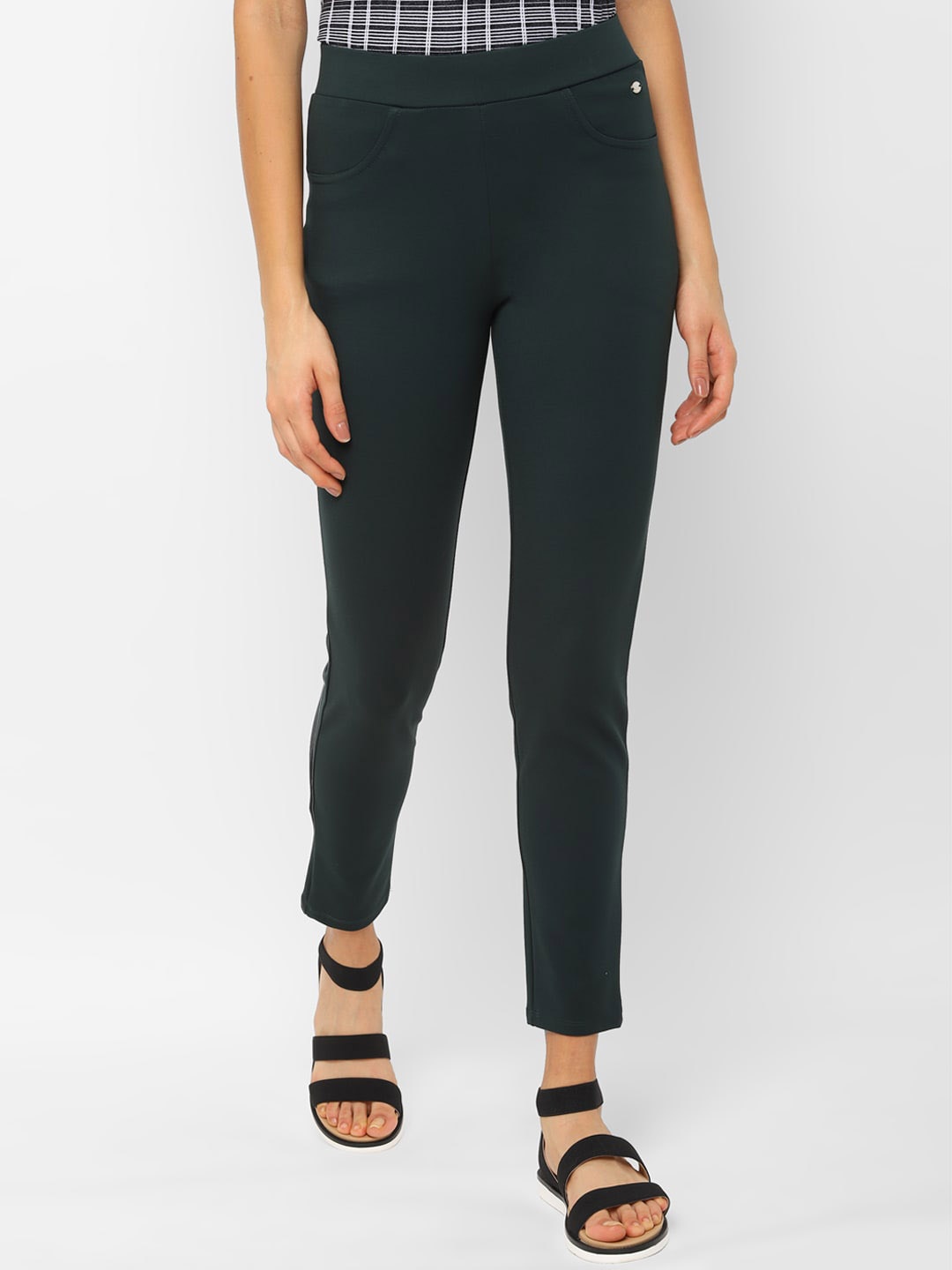

Allen Solly Woman Women Green Solid Treggings