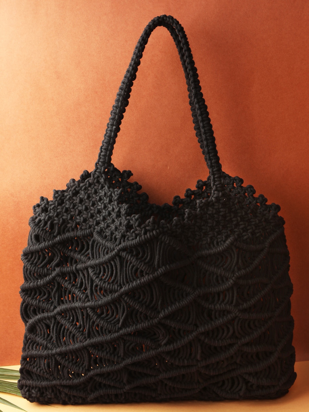 

STREET 9 Black Self Design Handheld Bag