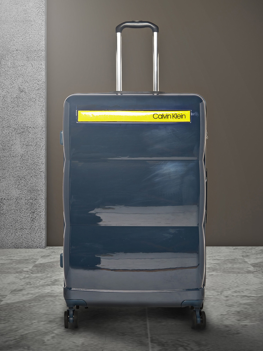 

Calvin Klein DOWN TO FLY Range Navy & Yellow Hard Large Luggage, Navy blue