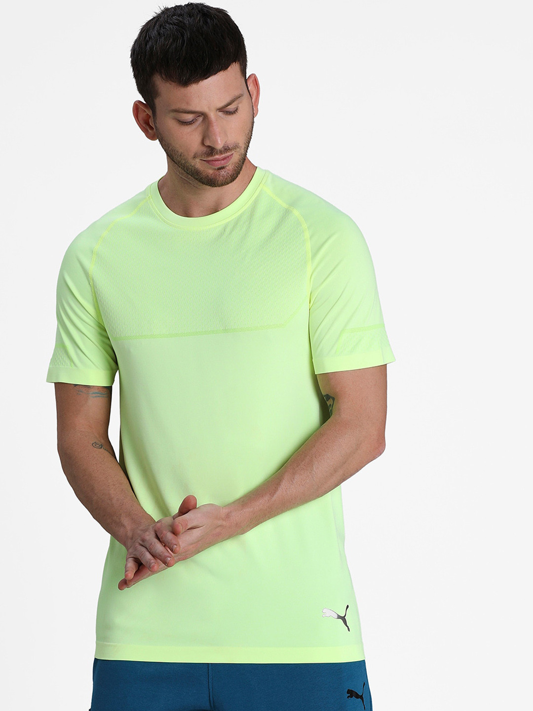 

Puma Men Yellow Solid Round Neck Energy evoKNIT T-shirt