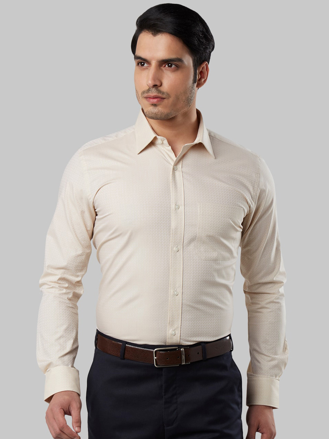 

Raymond Men Beige Regular Fit Self Design Formal Shirt