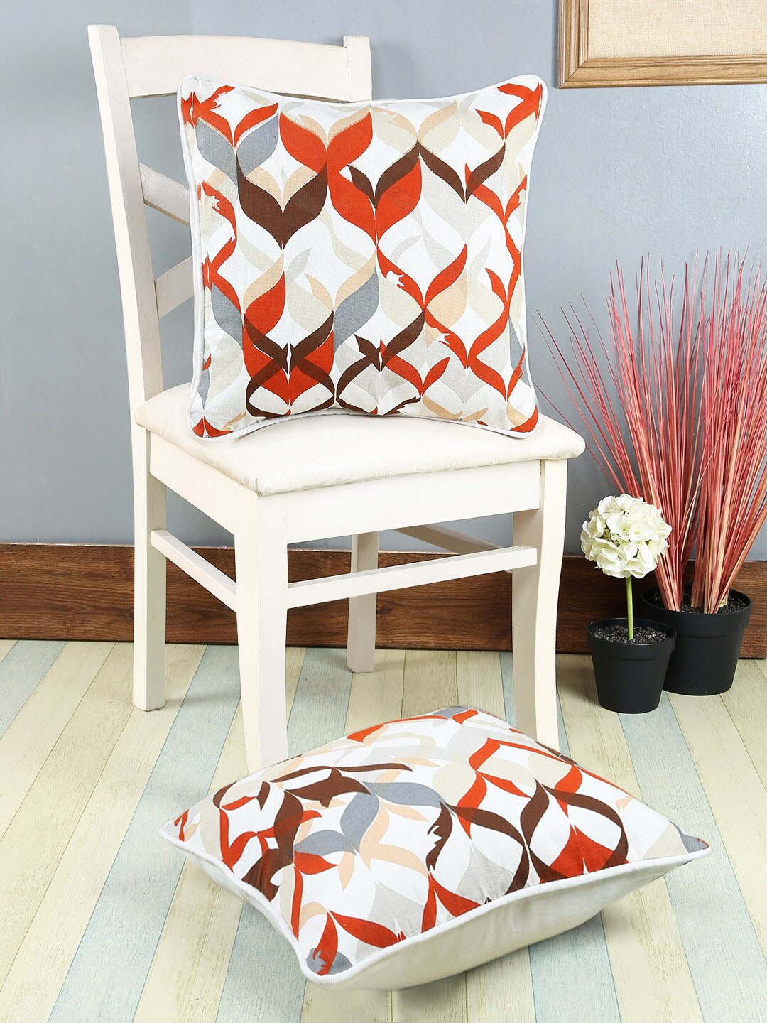 

Soumya White & Red Set of 2 Abstract Square Cushion Covers