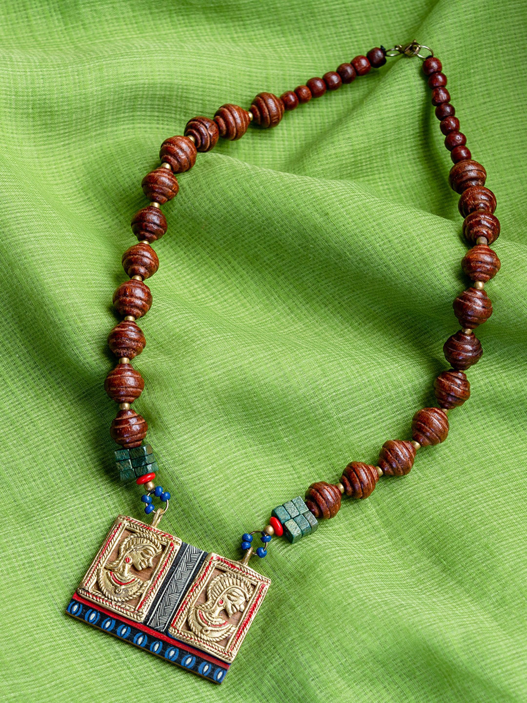 

ExclusiveLane Tribal Dhokra Twins Bohemian Brass Necklace Handmade in Dhokra Art, Brown