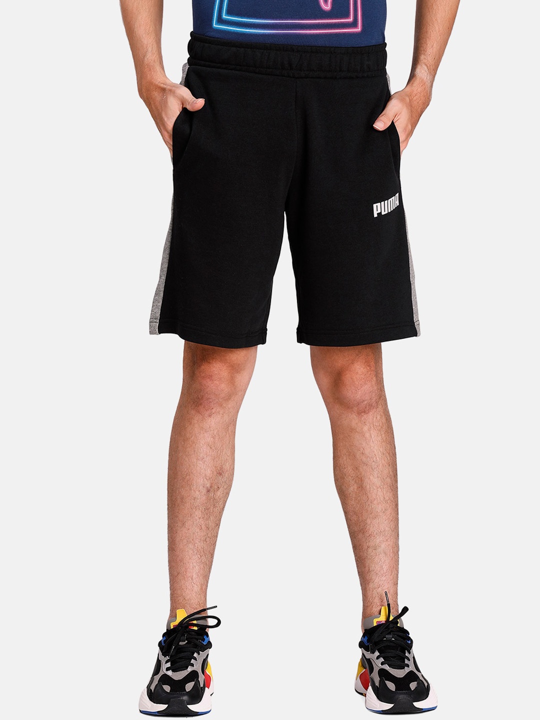 

Puma Men Black Solid Regular Fit Contrast Sweat Sports Shorts