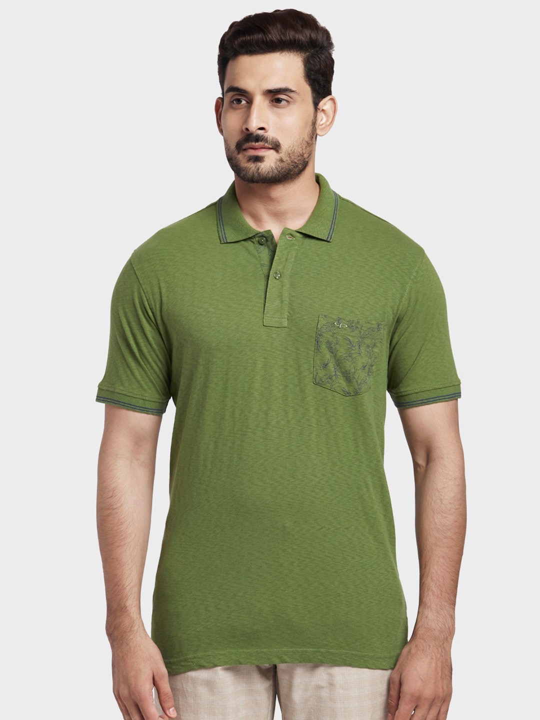 

ColorPlus Men Green Solid Polo Collar T-shirt