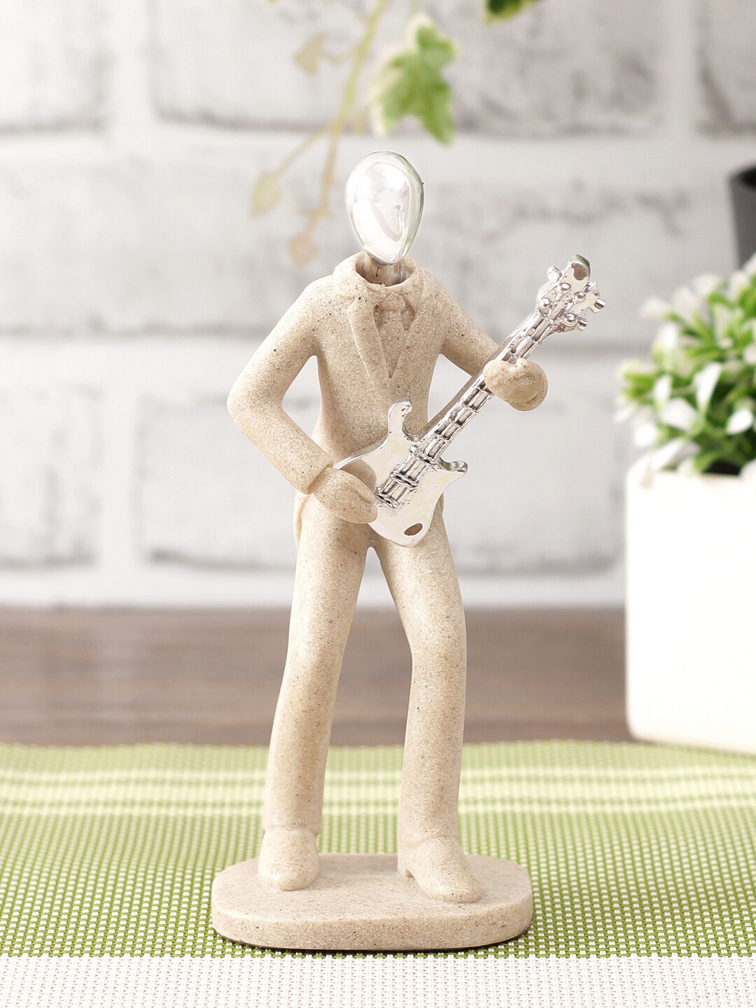 

TAYHAA Beige & Silver-Toned Stone Finish Musician Showpiece
