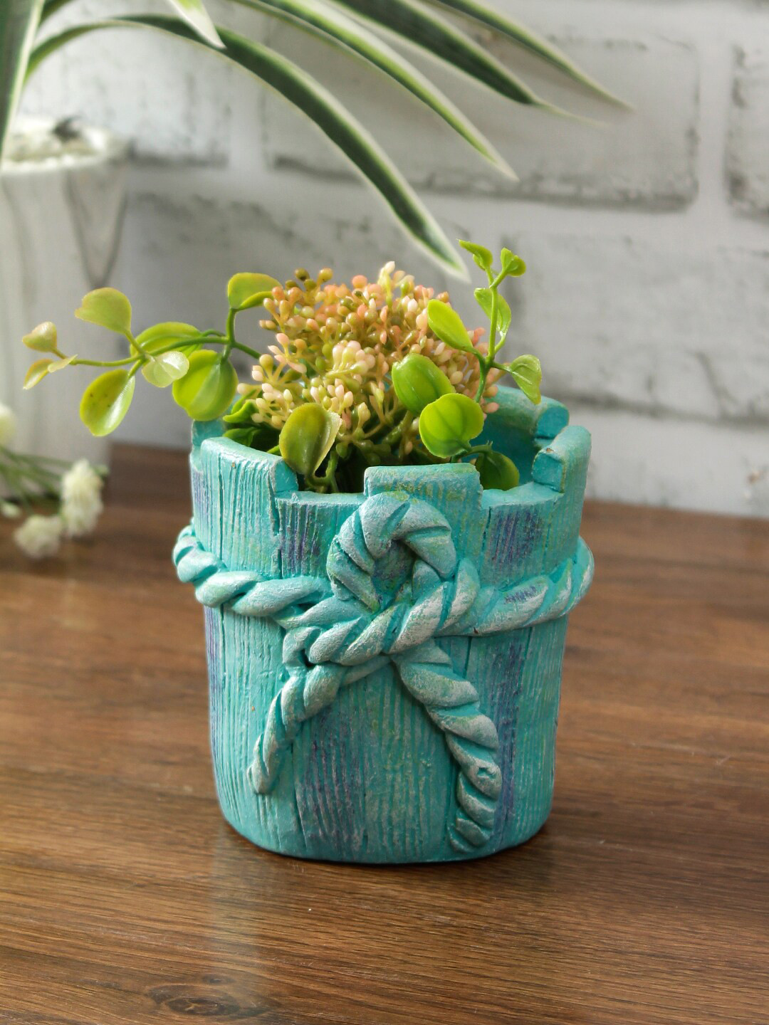 

Aapno Rajasthan Green Handcrafted Terracotta Fluorescent Planter