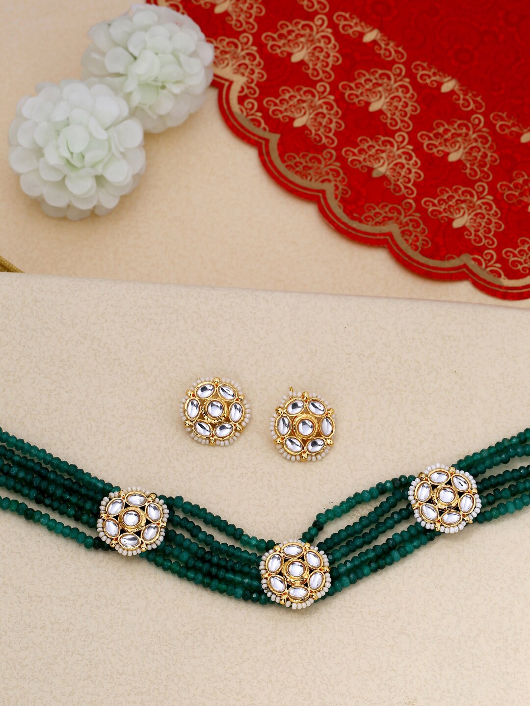 

Shoshaa Gold-Plated Green & White Kundan-Studded Beaded Handcrafted Jewellery Set