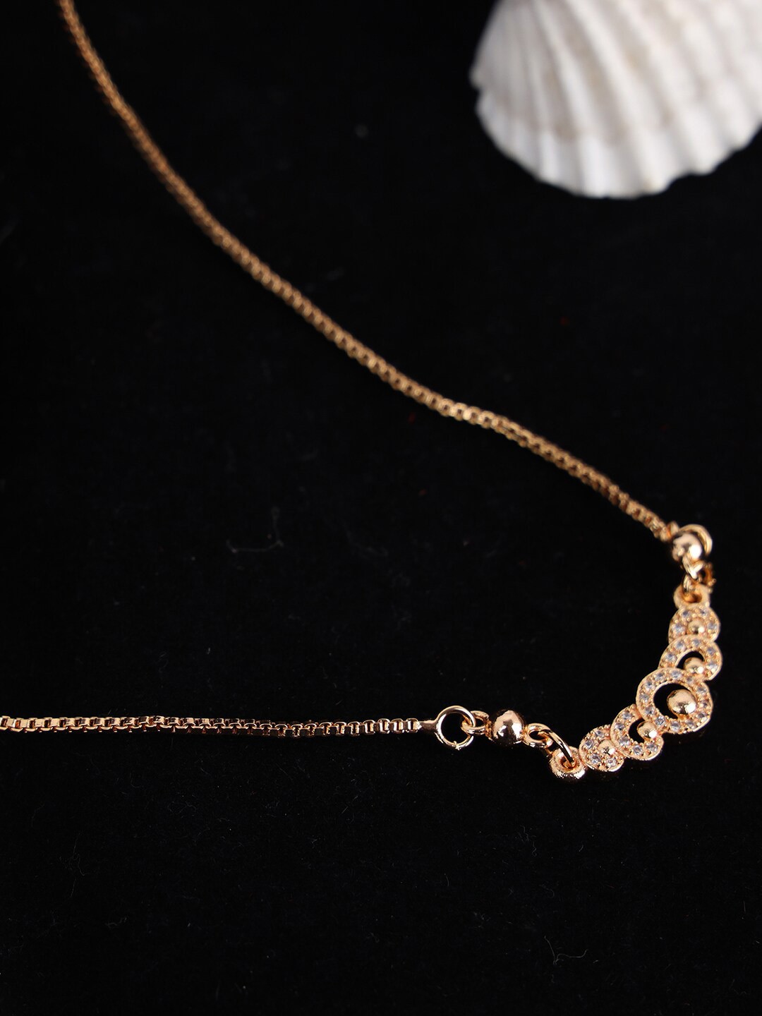 

Anikas Creation Gold-Plated AD-Studded Handcrafted Necklace