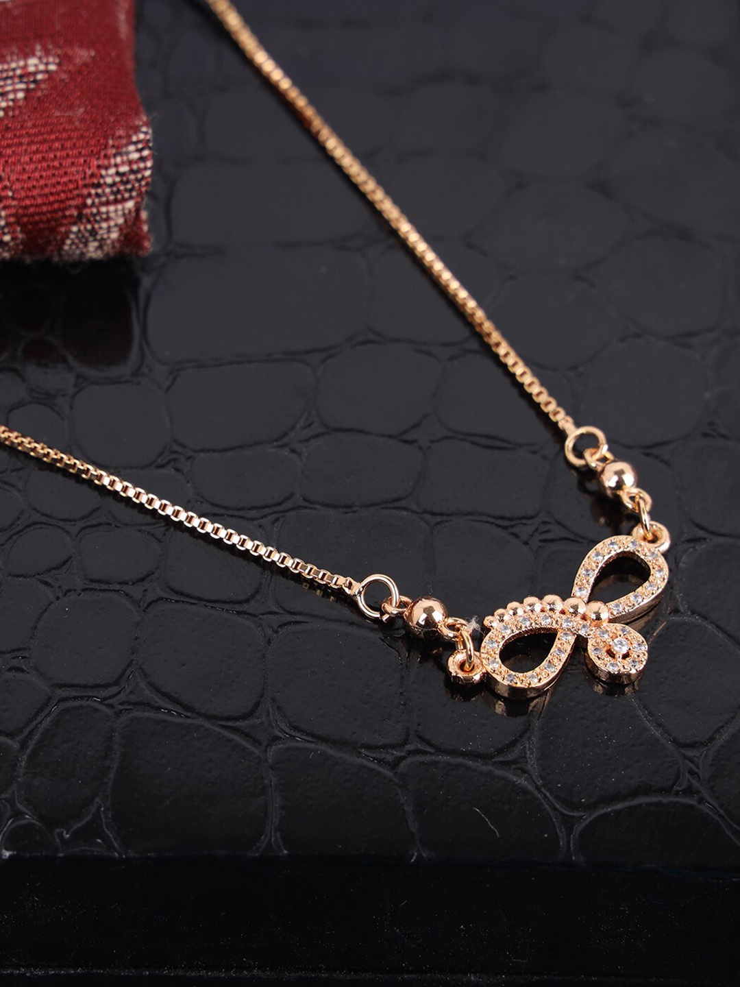 

Anikas Creation Gold-Plated AD-Studded Handcrafted Necklace