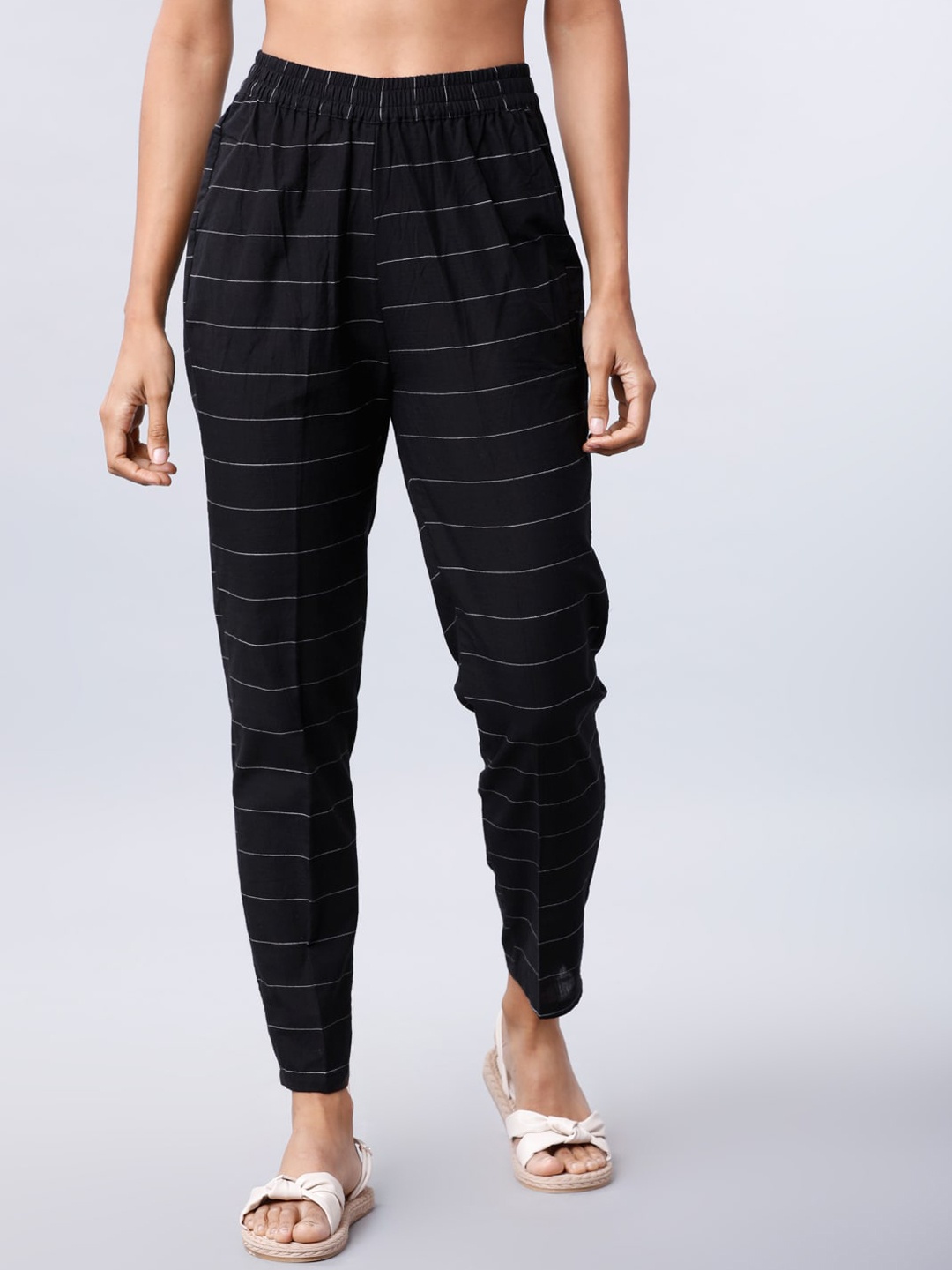 

Vishudh Women Black Regular Fit Checked Regular Trousers
