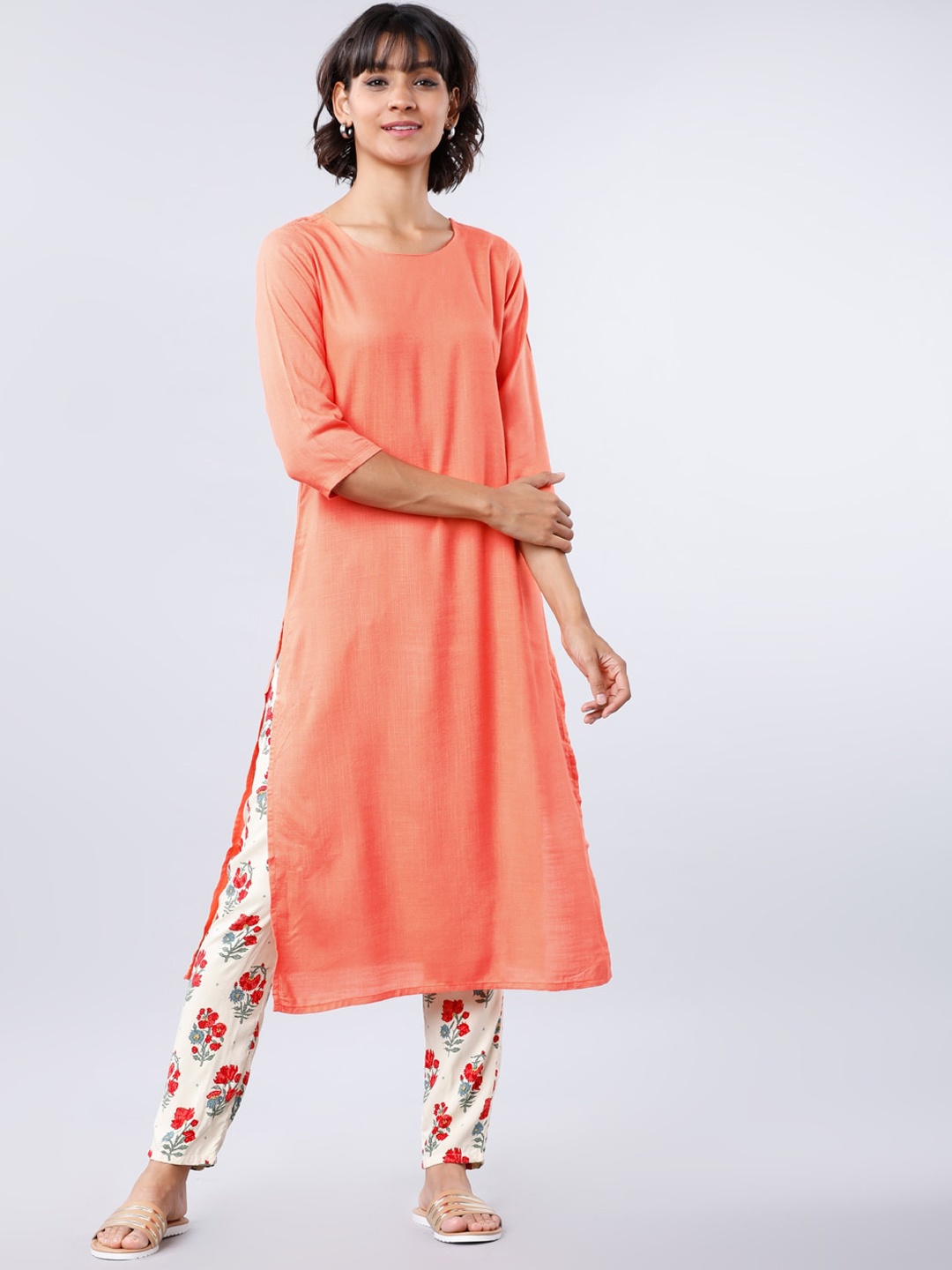 

Vishudh Women Peach-Coloured Solid A-Line Kurta