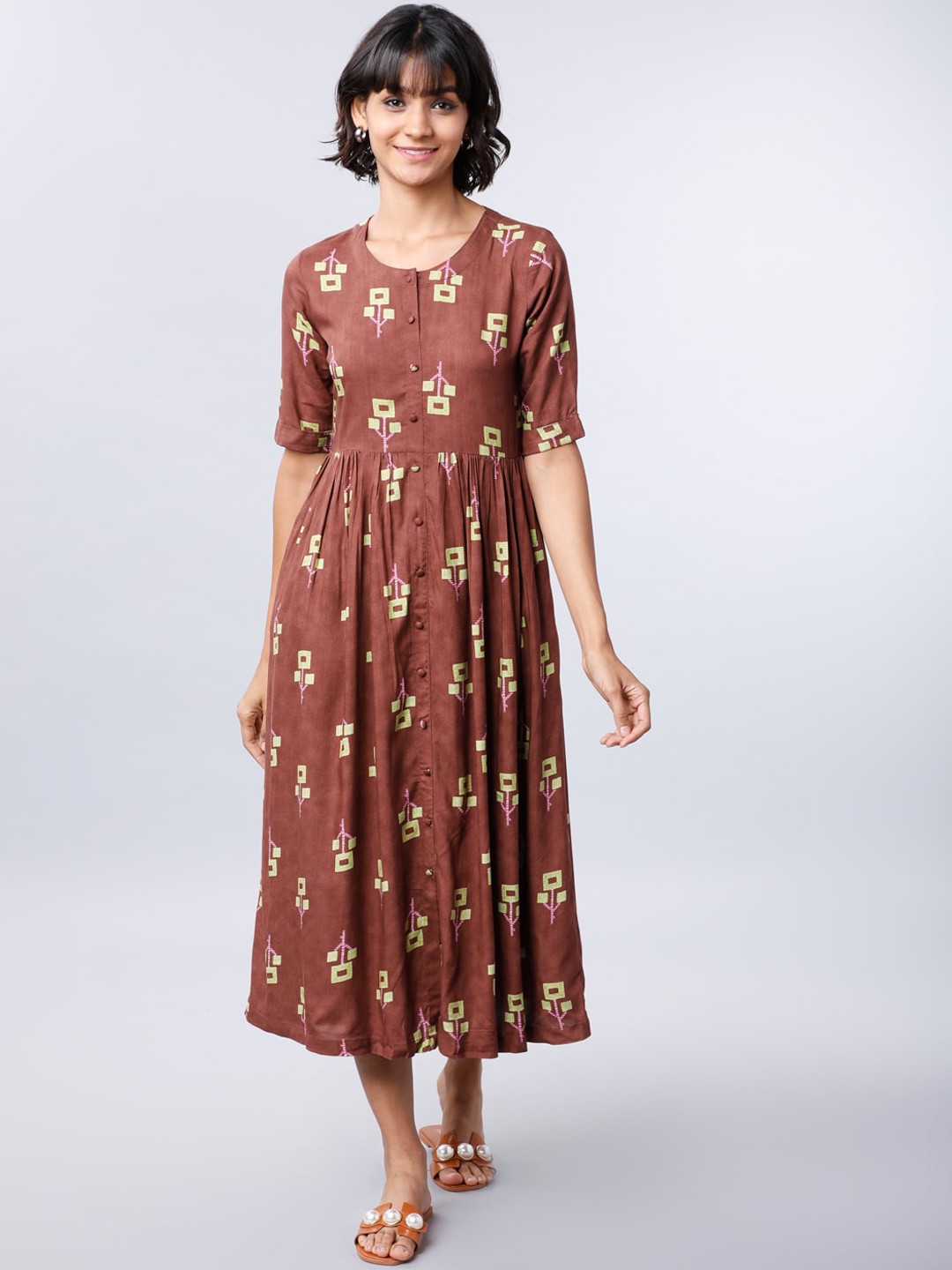 

Vishudh Women Brown & Lime Green Printed Fit and Flare Dress