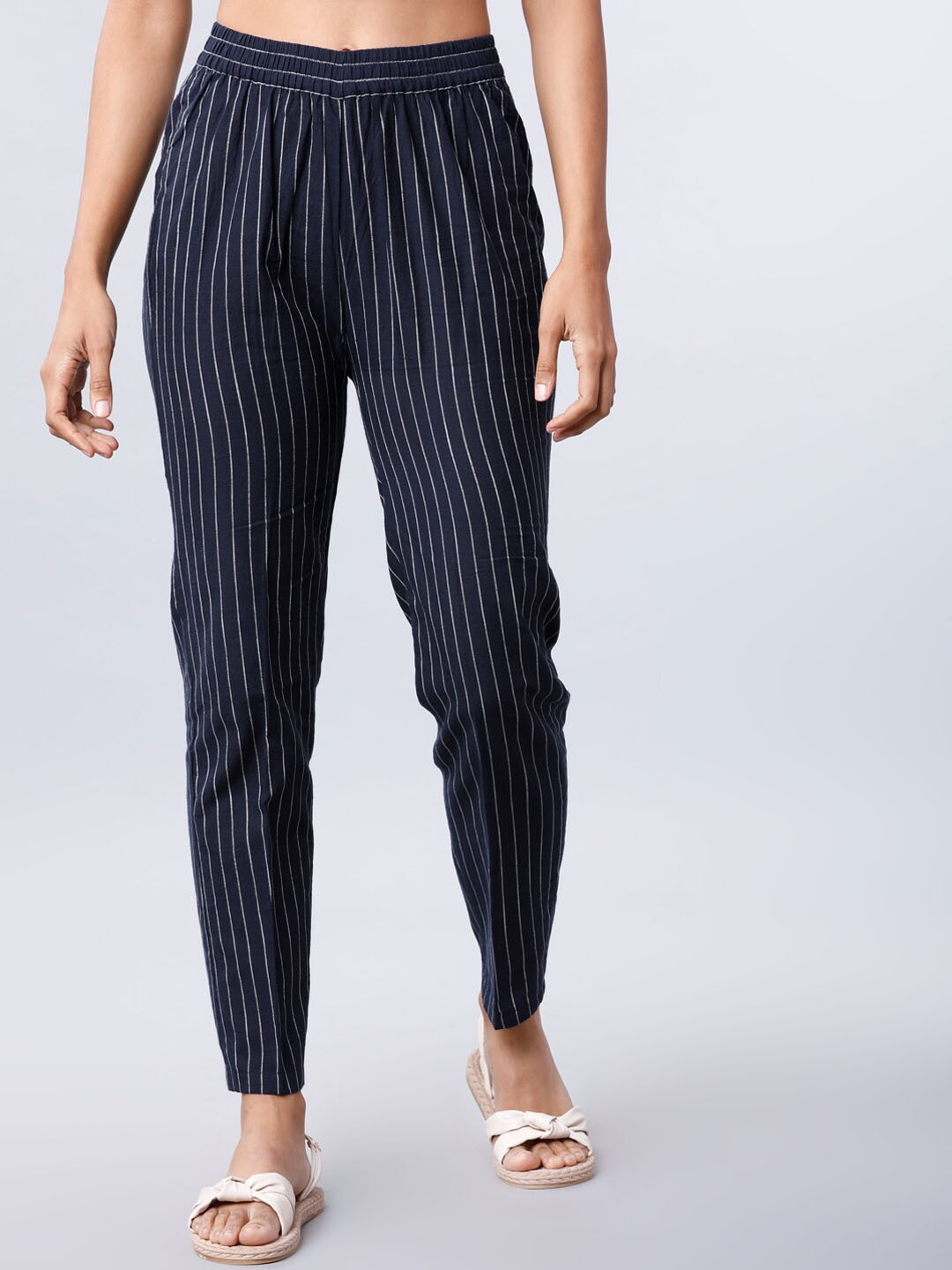

Vishudh Women Navy Blue & Off-White Regular Fit Striped Regular Trousers