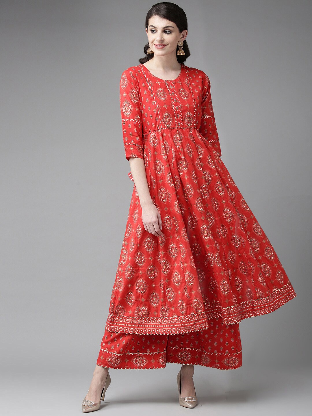 

Ishin Women Red Printed Kurta with Palazzos