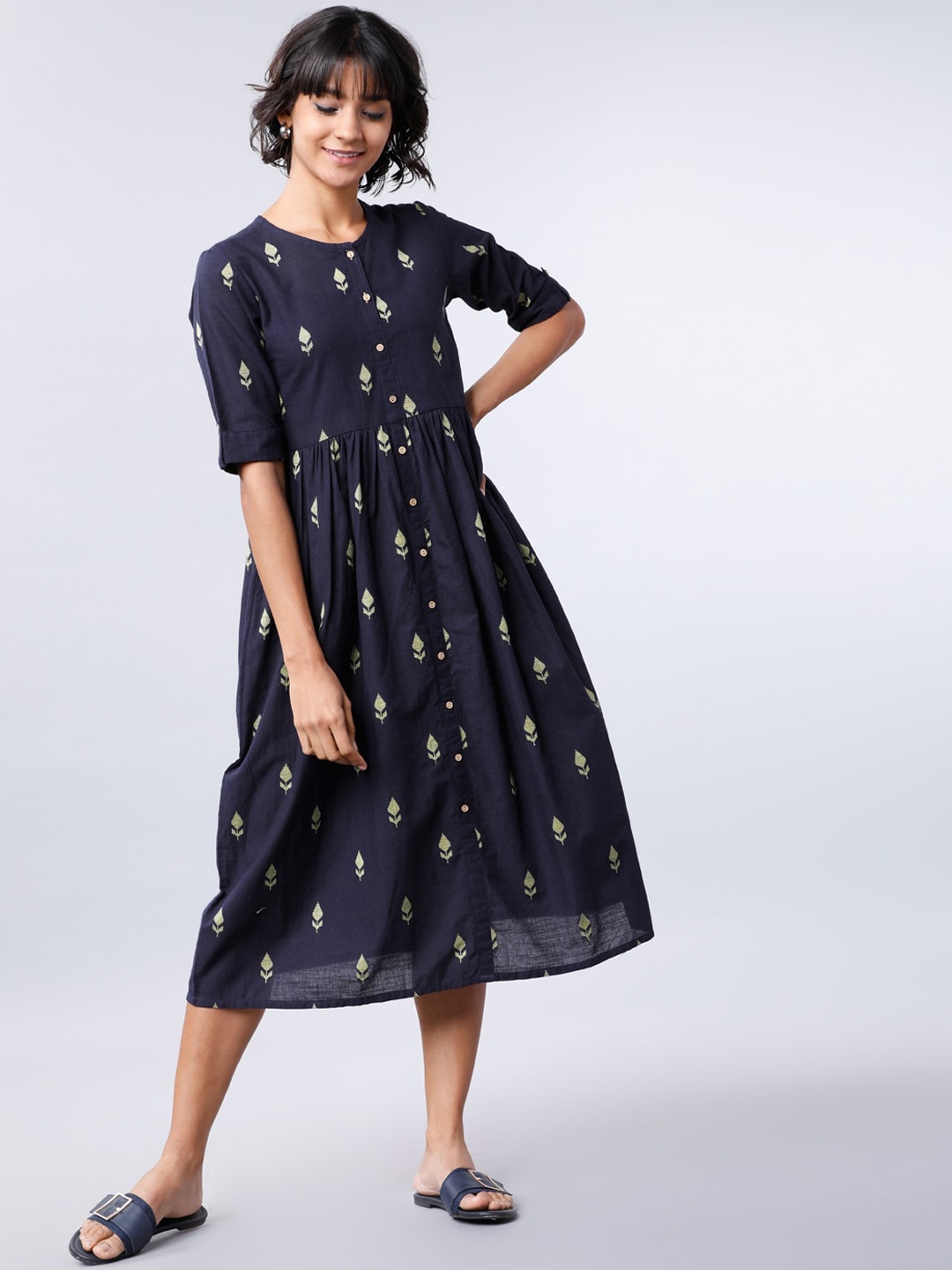 

Vishudh Women Navy Blue Self Design Fit and Flare Dress