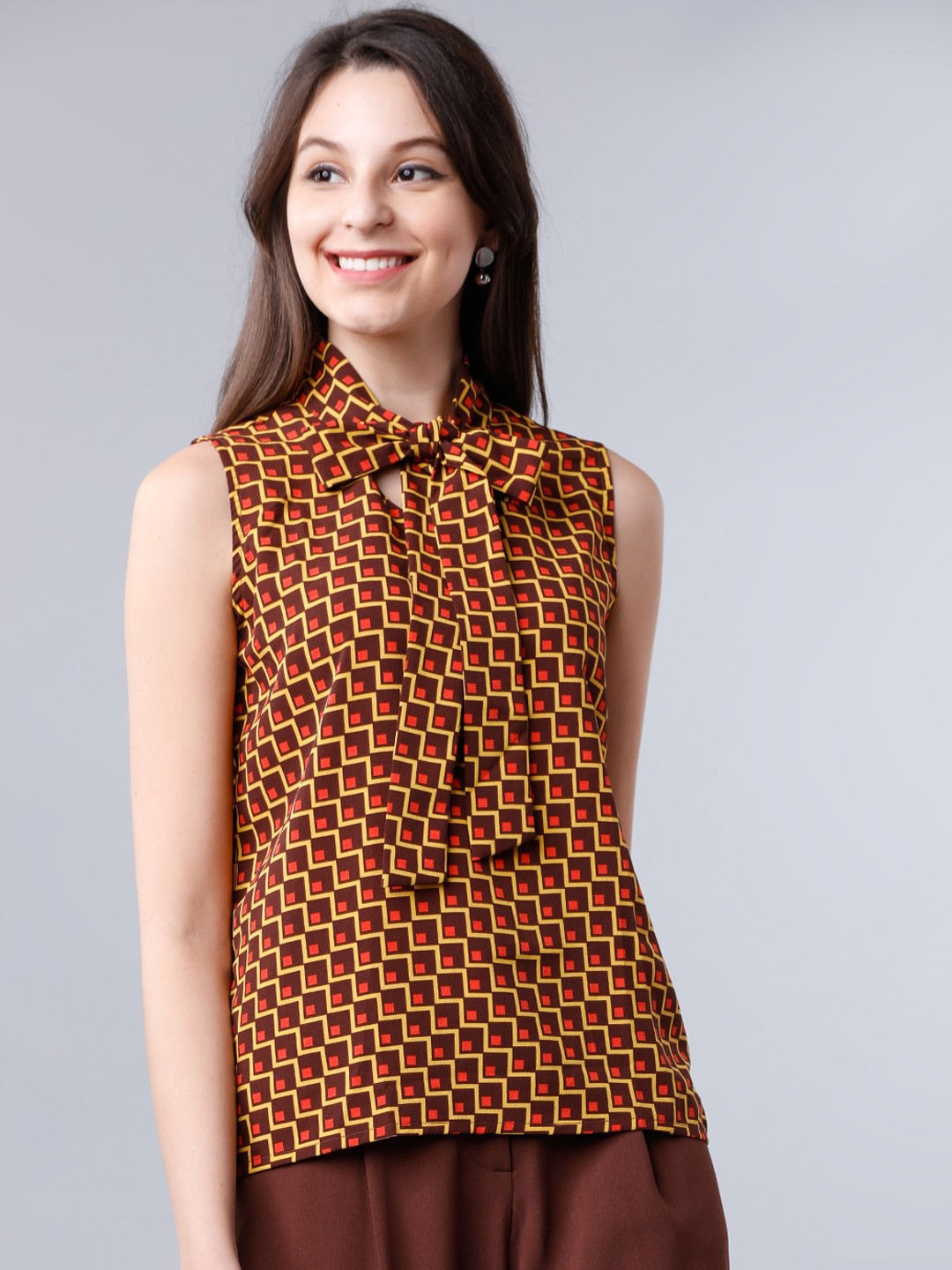 

Tokyo Talkies Women Brown & Yellow Printed Tie-Up Neck Top