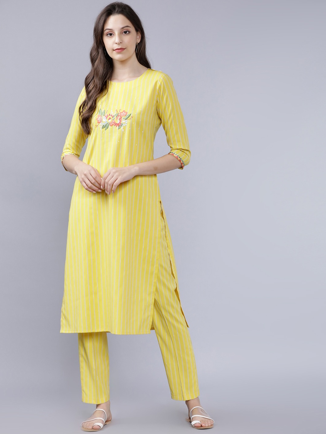 

Vishudh Women Yellow Embroidered Kurta with Trousers