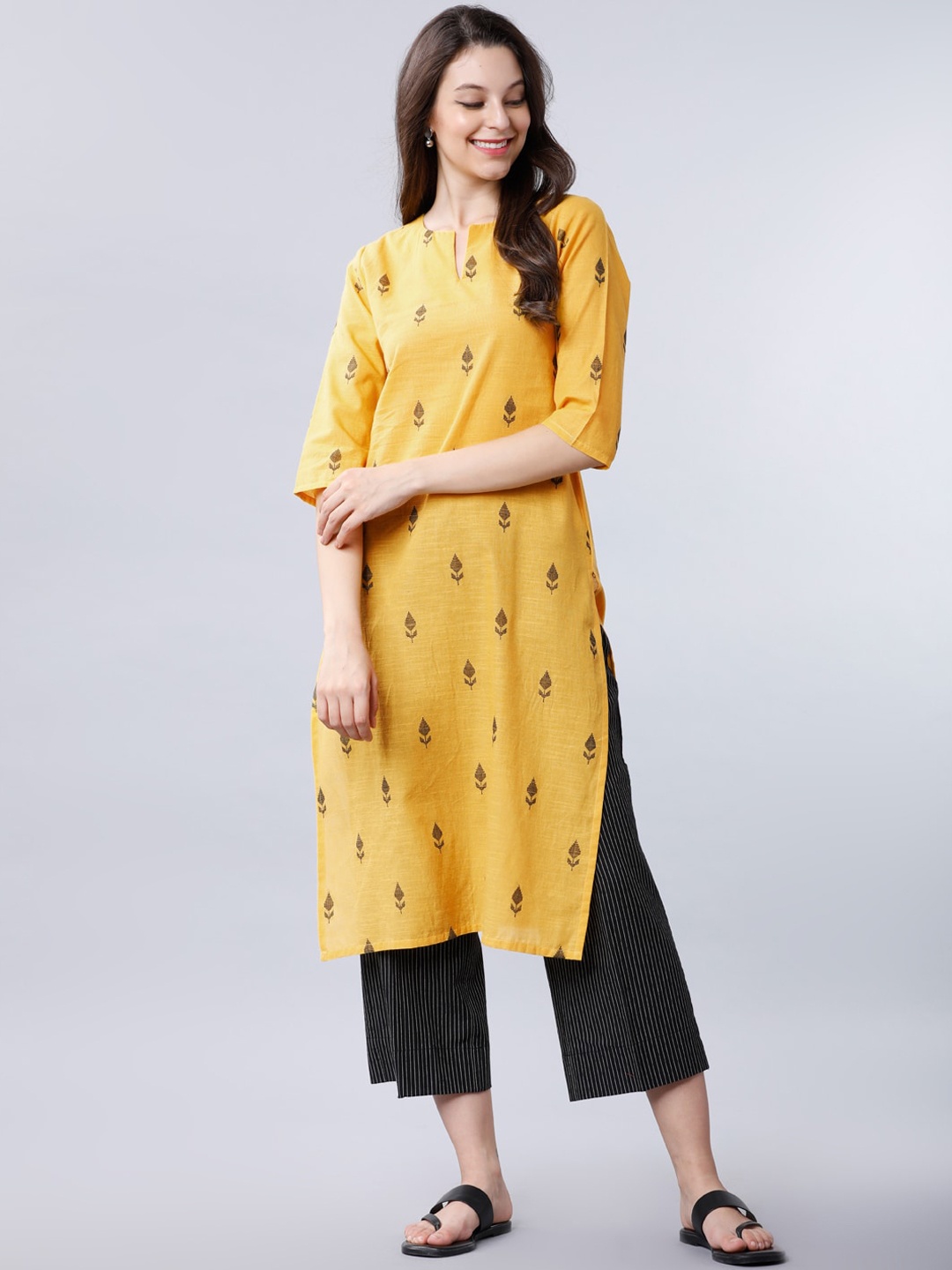 

Vishudh Women Yellow & Black Printed Straight Kurta
