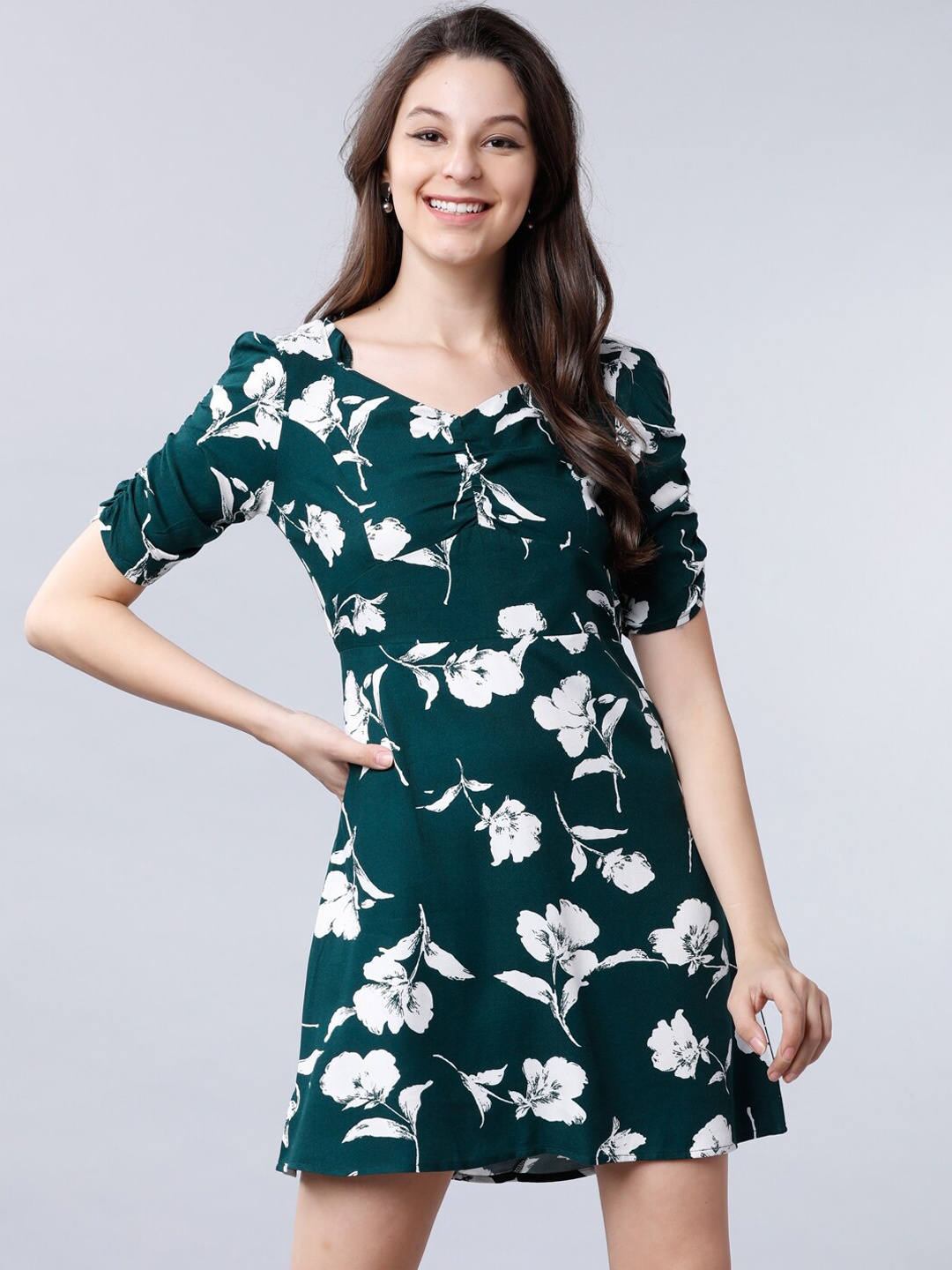 

Tokyo Talkies Women Green Floral Printed Fit and Flare Dress