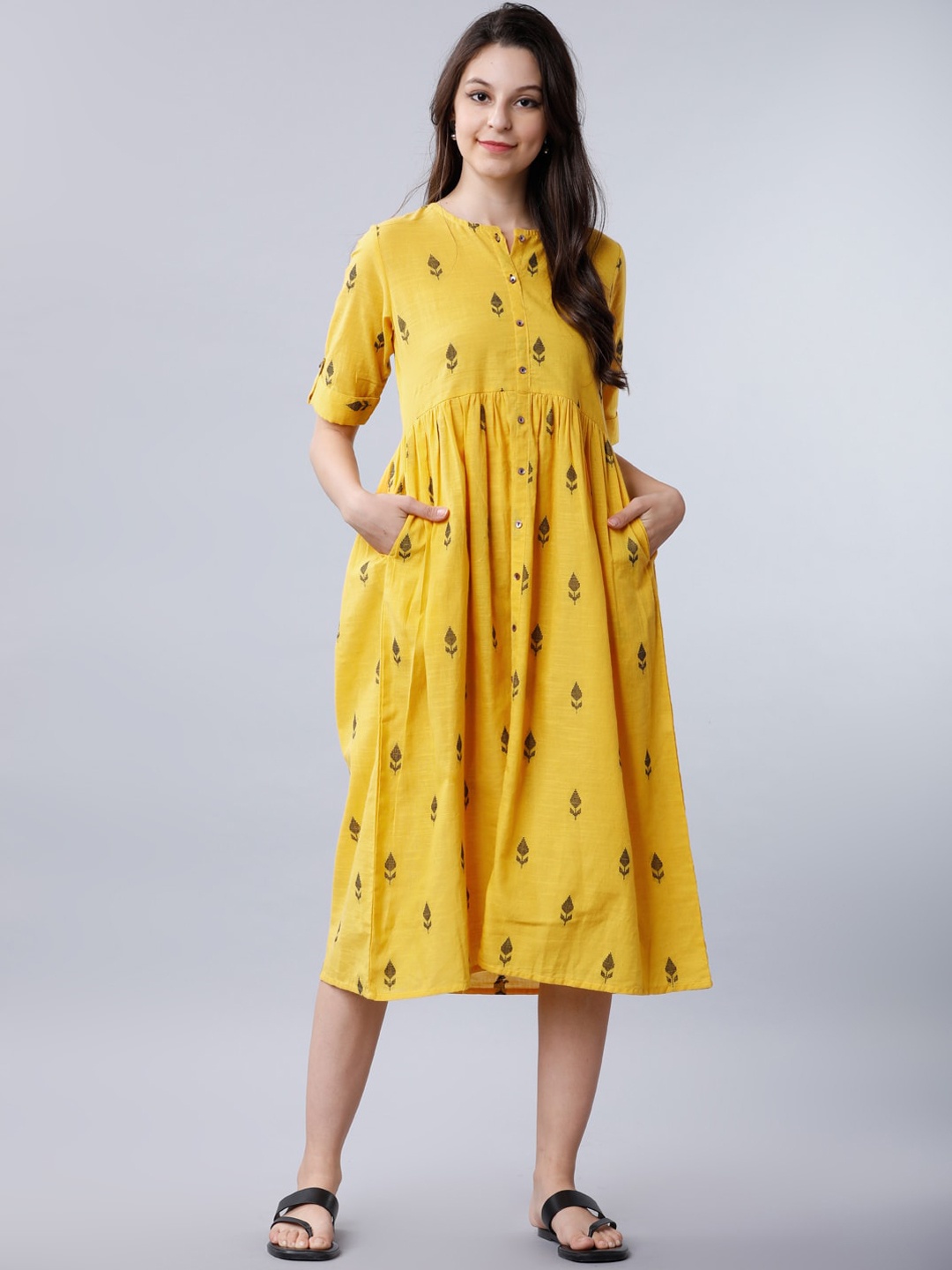 

Vishudh Yellow Ethnic Motifs Printed Fit and Flare Dress