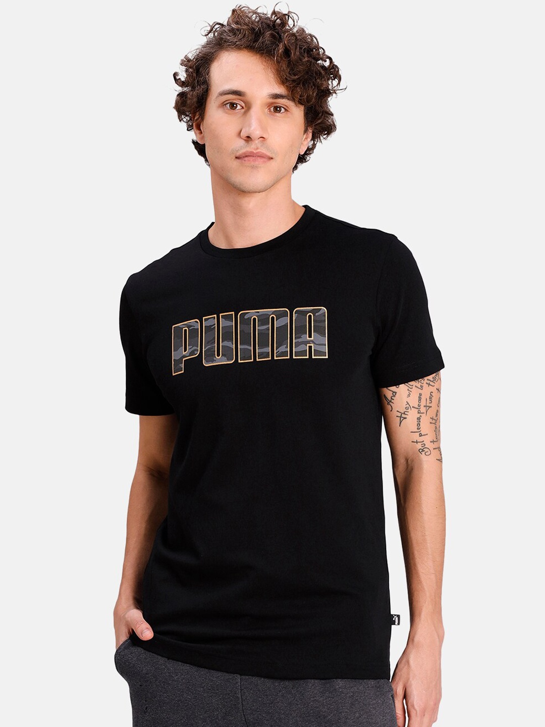 

Puma Men Black Printed Round Neck T-shirt