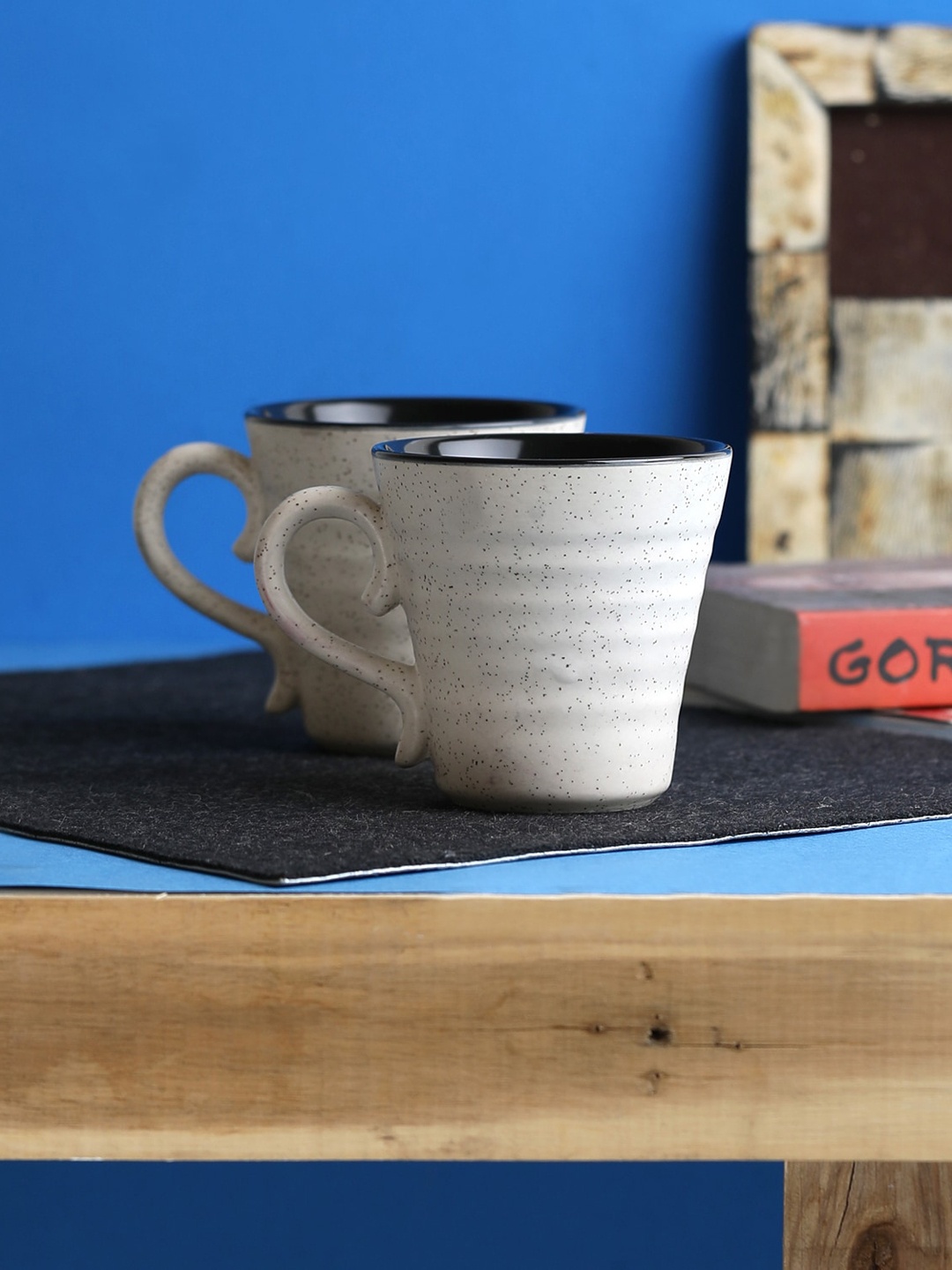 

MIAH Decor 2 Pieces Off-White Textured Ceramic Cups Set