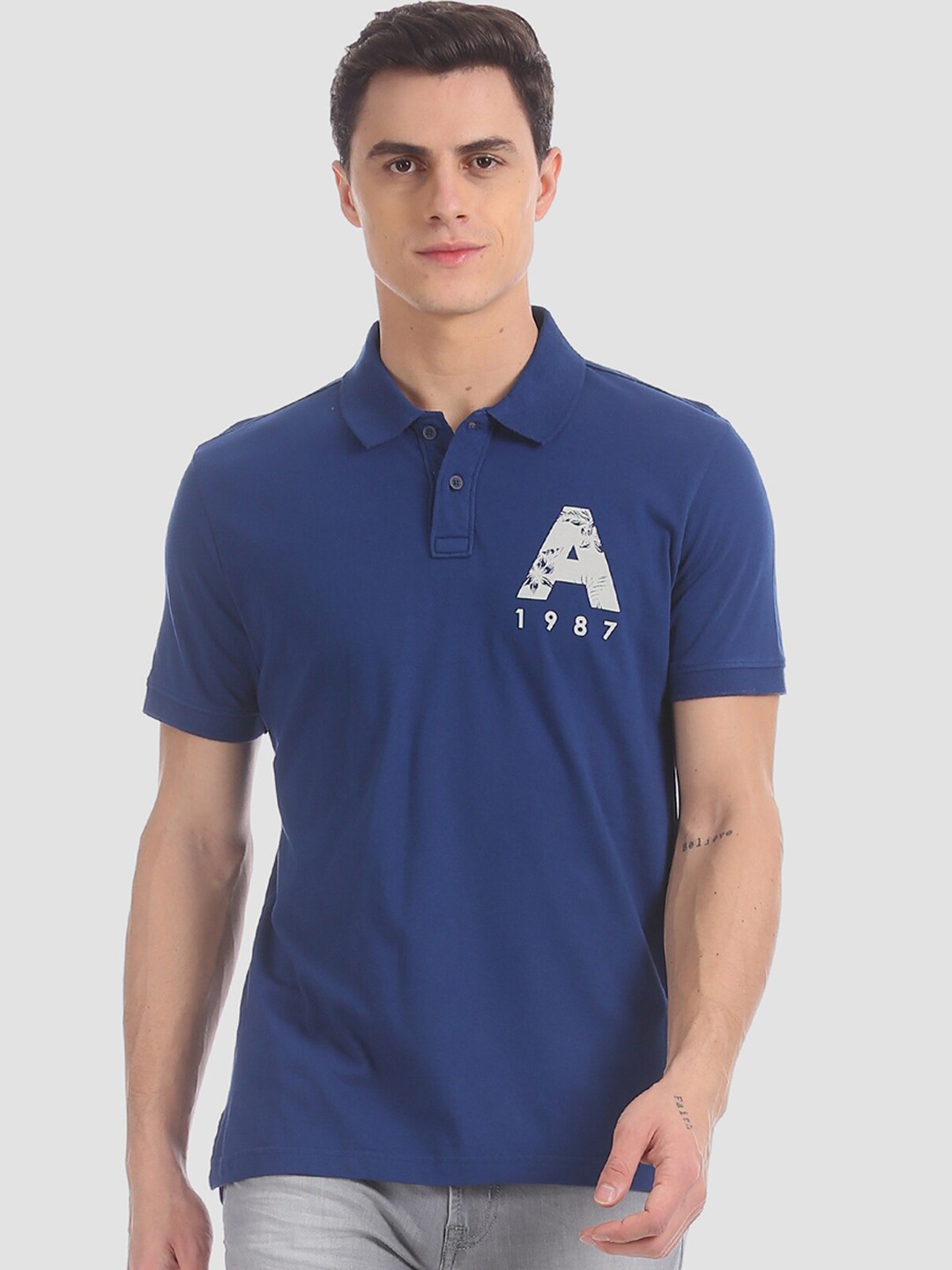 

Aeropostale Men Blue Solid Polo Collar T-shirt