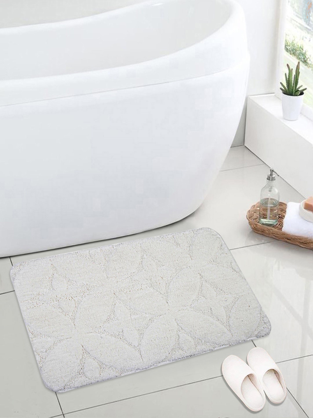 

Saral Home Off-White Self-Design Anti-Skid Bath Rug
