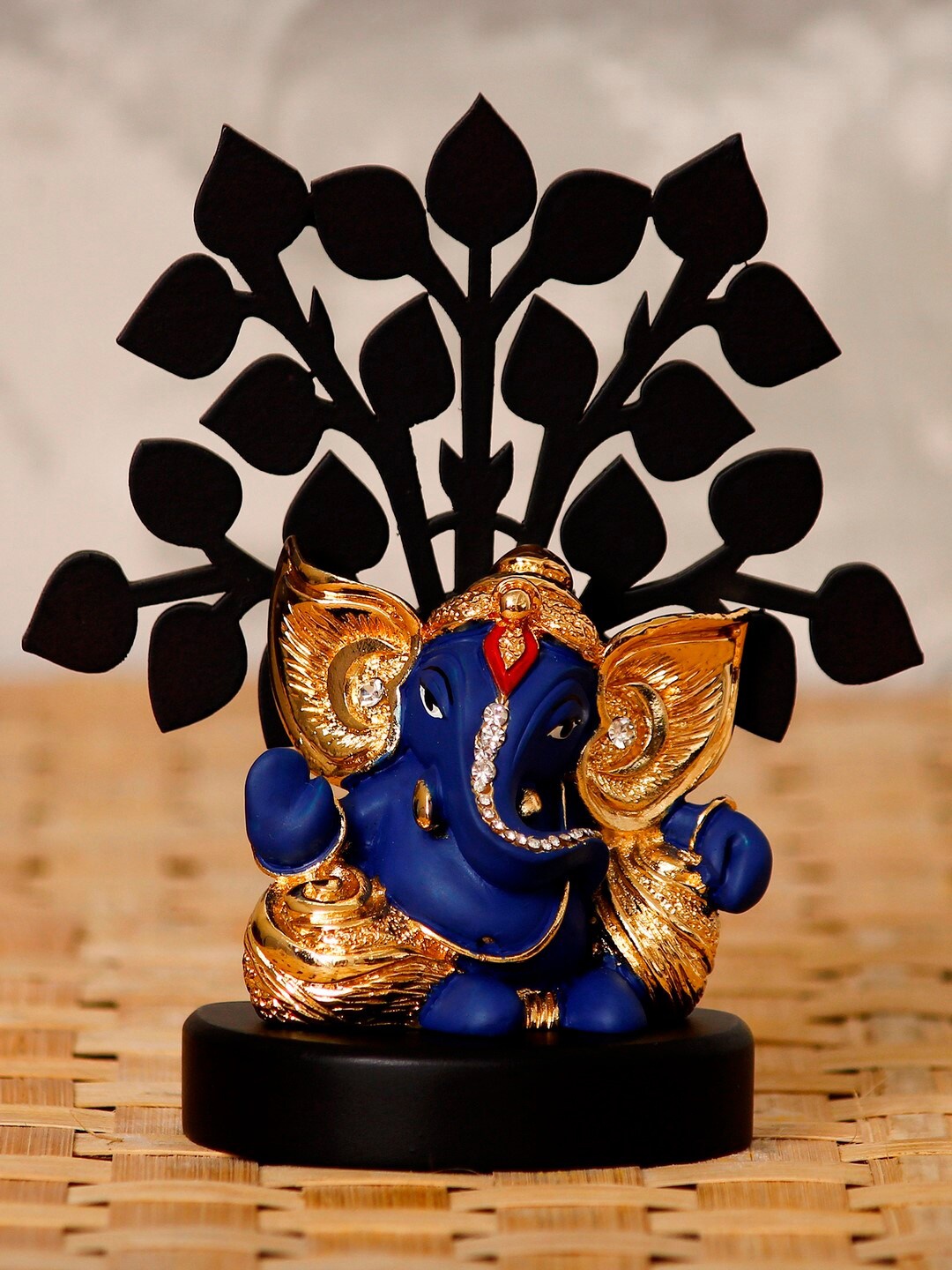 

eCraftIndia Gold-Plated Blue & Black Kaan Ganesha With Wooden Tree Showpiece