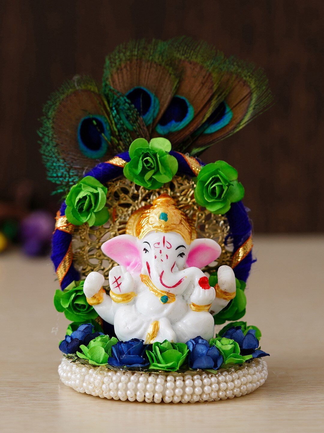 

eCraftIndia Blue & Green Handcrafted Lord Ganesha Idol On Floral Plate with Peacock Feather Decorative Showpiece, White