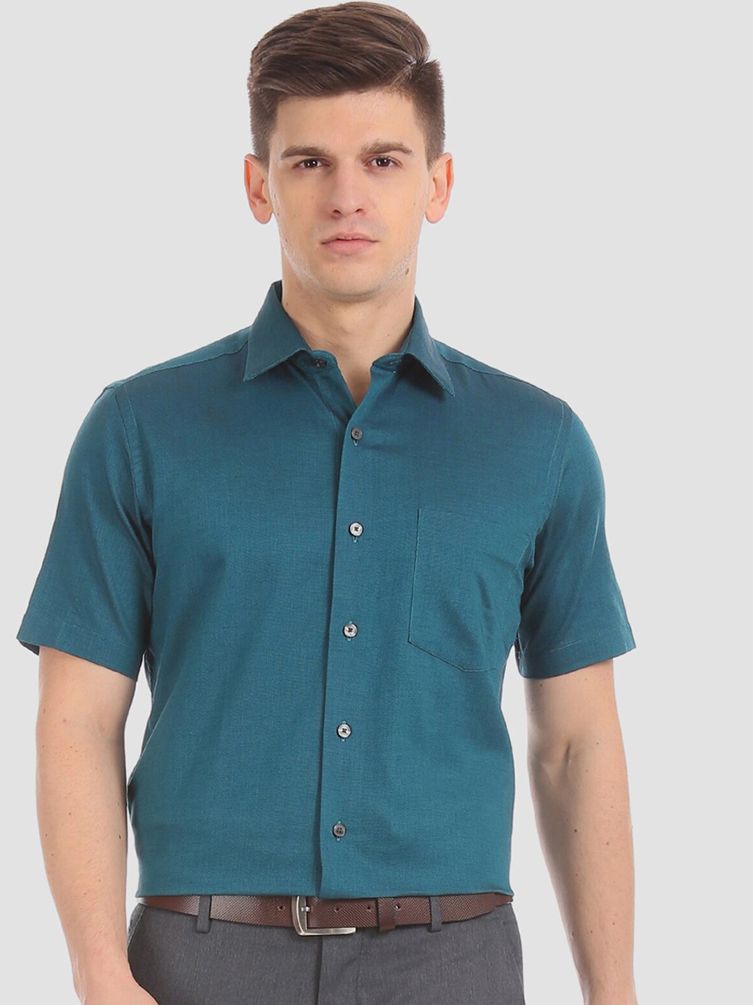 

Arrow Men Teal Blue Regular Fit Solid Formal Shirt