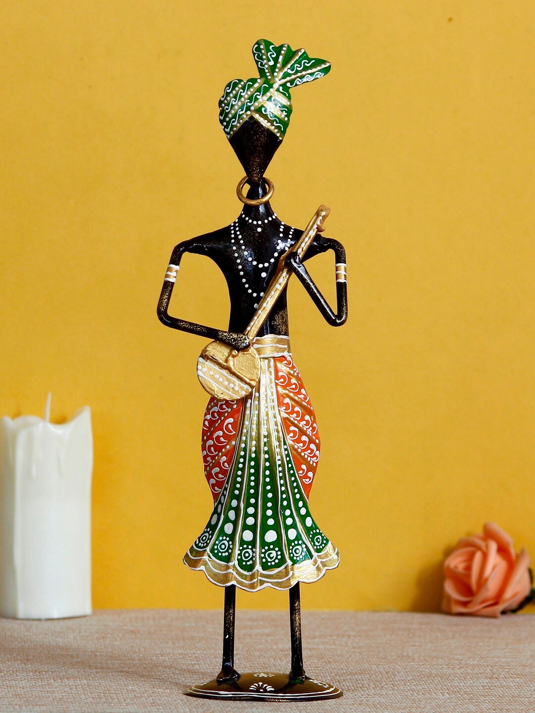 

eCraftIndia Green & Black Tribal Man Playing Dholak Decorative Showpiece