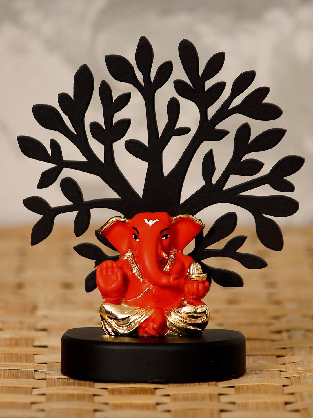 

eCraftIndia Gold-Plated Orange & Black Appu Ganesha With Wooden Tree Showpiece