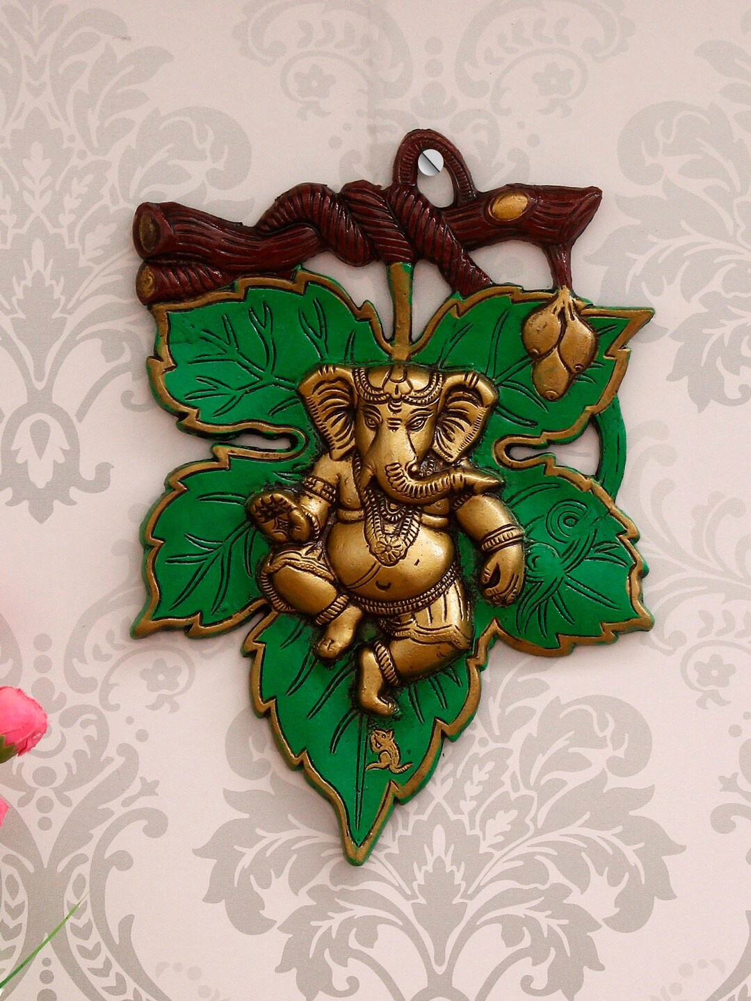 eCraftIndia Green & Golden Dancing Lord Ganesha on Leaf Metal Wall Hanging