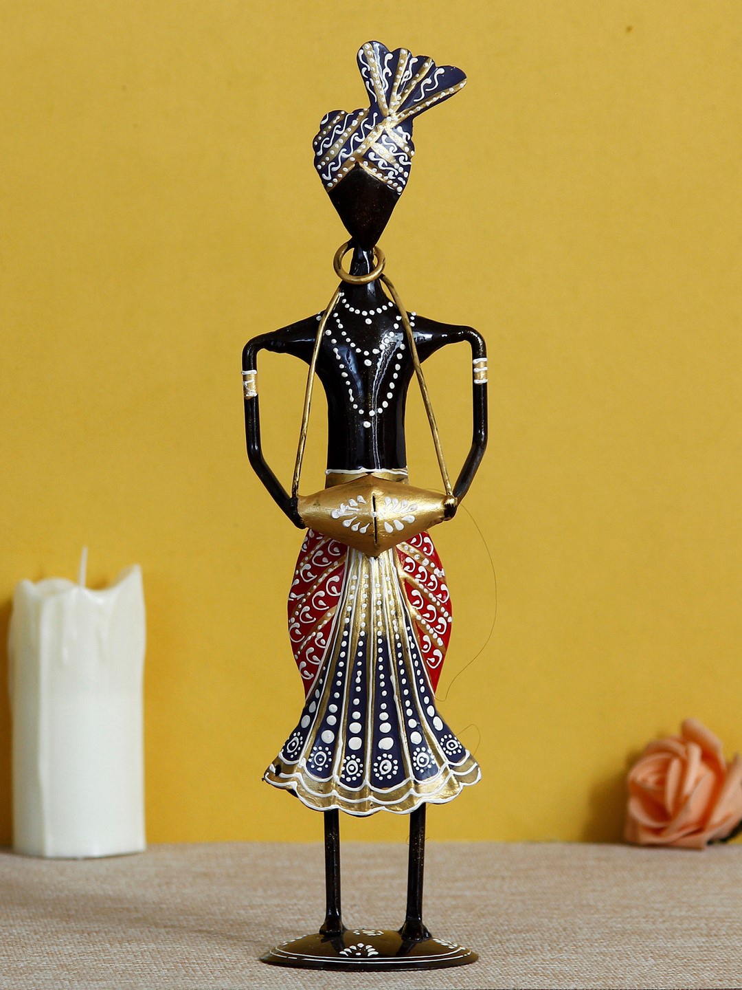 

eCraftIndia Orange & Black Textured Metal Handcrafted Tribal Man Playing Musical Instrument Banjo Showpiece