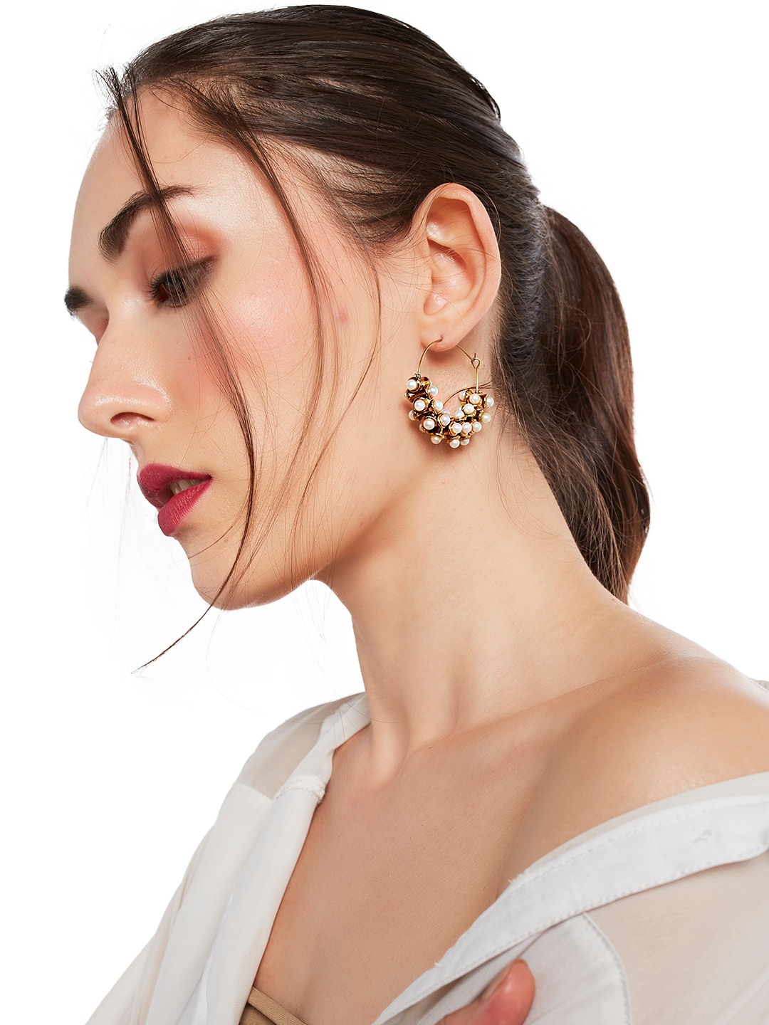 

Fida Gold-Toned & White Circular Gold Plated Handcrafted Hoop Earrings