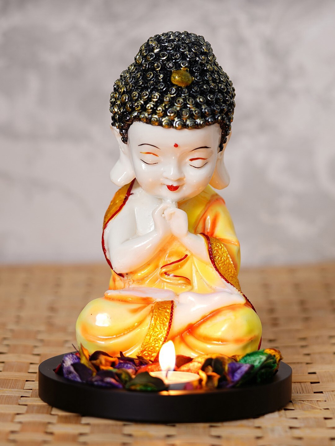 

eCraftIndia Orange & White Praying Monk Buddha With Wooden Base Fragranced Petals & Tealight Showpiece, Yellow