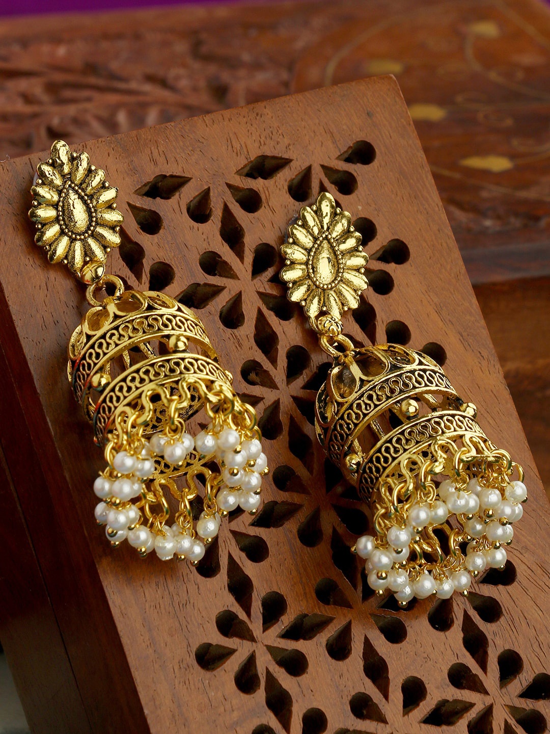 

ANIKAS CREATION White Gold Plated Handcrafted Dome Shaped Jhumkas