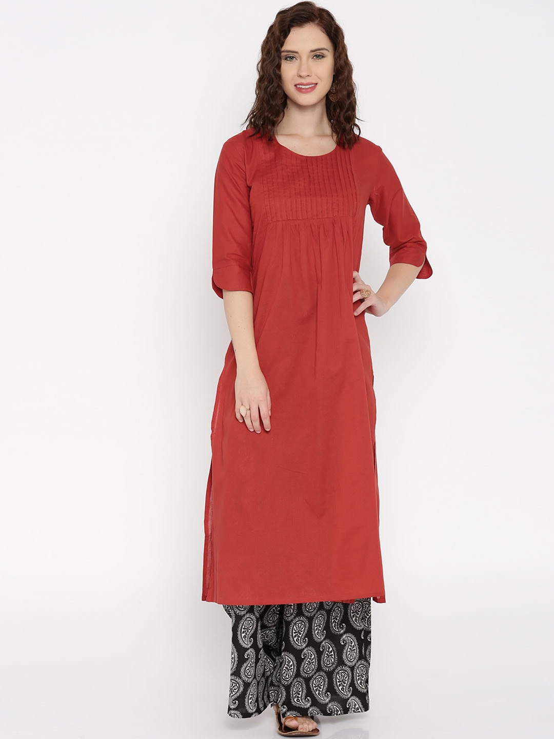 

Desi Weavess Women Rust Solid Straight Kurta