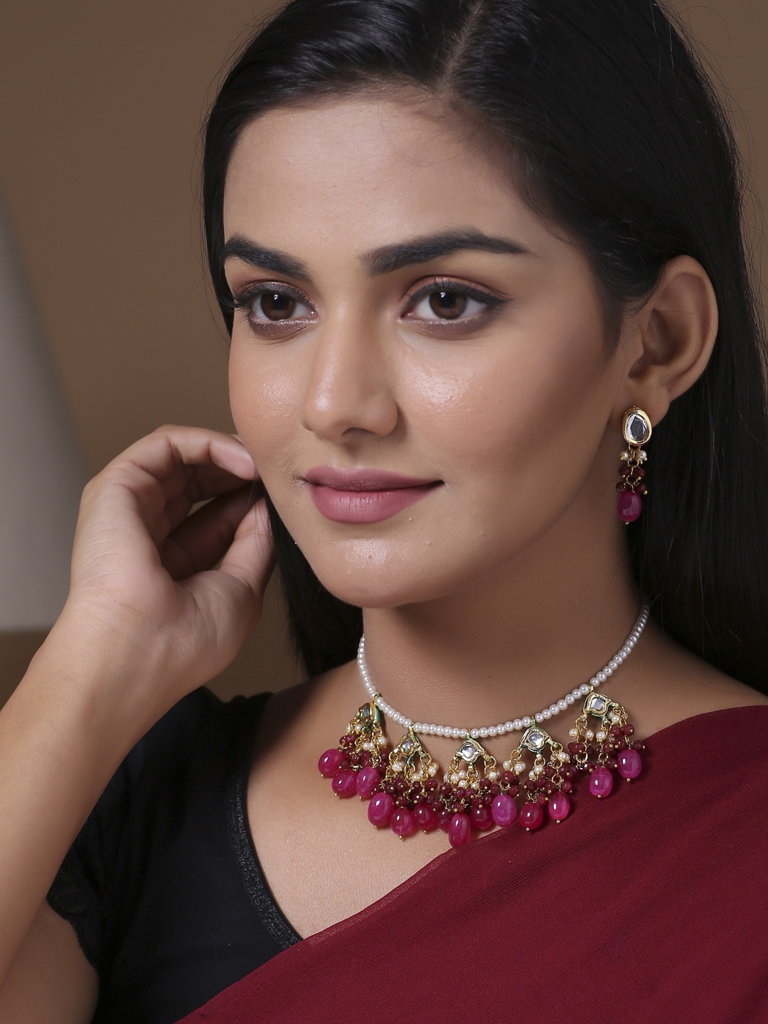 

Shoshaa Gold & Pink Artificial Stone Studded Jewellery Set